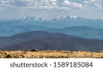 View of the nearest mountain range from an alpine meadow