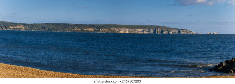 View of the Needles, a row of three stacks of chalk that rise about 30 metres out of the sea off the western extremity of the Isle of Wight in the English Channel, UK