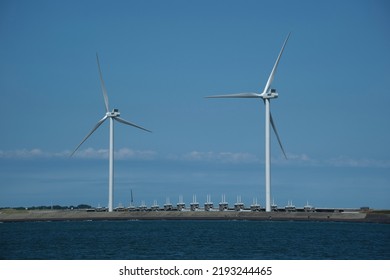 View Of Neeltje Jans Flood Barrier With Wind Turbines