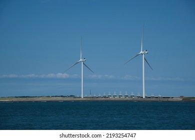 View Of Neeltje Jans Flood Barrier With Wind Turbines