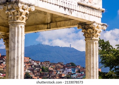 View of the neighborhoods and the El Ávila hill from some Roman columns in the General South Cemetery in Caracas
