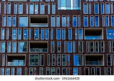 View Of New Build Flats With Rectangular Windows And Balconies