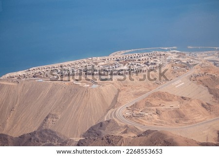 view of a new city galala built on very high mountain with back ground of skies and mountains
