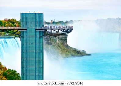 View of Niagara Falls and observation tower in autumn.