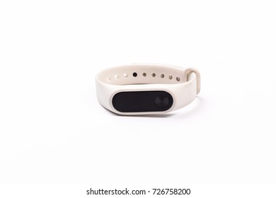 view of nice new white rubber fitness tracker with monitor isolated on white background