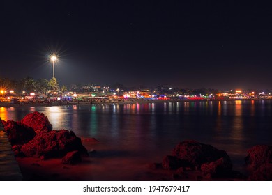  View Of Night Lights On A Ocean Coast From Cape In Goa 