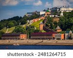 A view of the Nizhny Novgorod Kremlin, a historic fortress located on a hill overlooking the Volga River and Chkalov stairs seen in the background. Russia view.