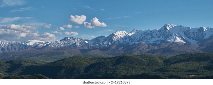 View of the North Chuisky Range in summer. Beautiful snow-capped peaks. Glaciers and snow-covered rocks. - Powered by Shutterstock