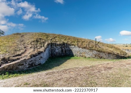View of Northern end of Belas Knap Long Barrow with false door, located along the Cotswold Way footpath on Cleeve Hill, Winchcombe, Cheltenham, UK, a Neolithic burial ground from around 3000 BC