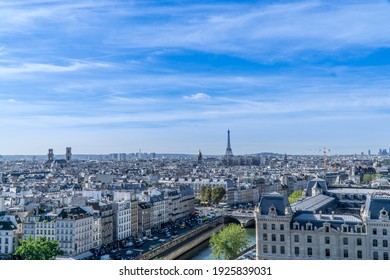 The view from Notre Dame de Paris (France) in a sunny day with some clouds