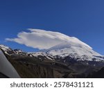 View o the Elbrus peak with a cloud on it