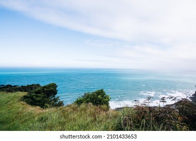 View Of The Ocean From Cliffs On The West Coast Of New Zealand. Taken Near Raglan, NZ.