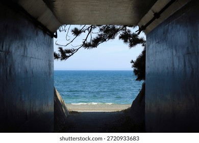 View of the Ocean Through an Underground Passage