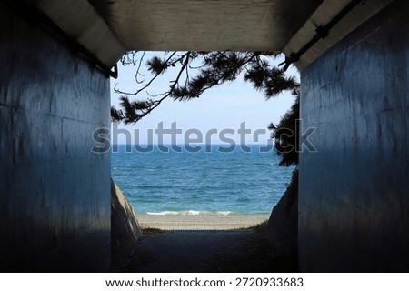 View of the Ocean Through an Underground Passage