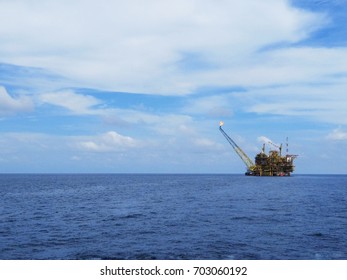 View Of An Offshore Production Platform At Sea. Oil And Gas Industry Outlook Are Still Gloomy With The Low Oil Price Are Badly Affecting Most Of The Oil And Gas Producer. 