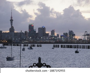 A View From Okahu Bay Looking Towards Auckland's CBD At Dusk 