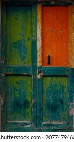 View Of A Old Beautiful House Exterior And Front Door Seen On An Italian Village Street.