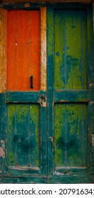 View Of A Old Beautiful House Exterior And Front Door Seen On An Italian Village Street.