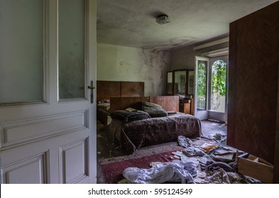 View In Old Bedroom With Bed And Objects