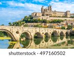 View at the Old Bridge over Orb river with Cathedral of Saint Nazaire in Beziers