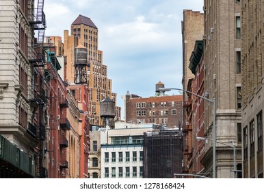 View of the old buildings and water towers in the Tribeca neighborhood of Manhattan, New York City NYC - Powered by Shutterstock