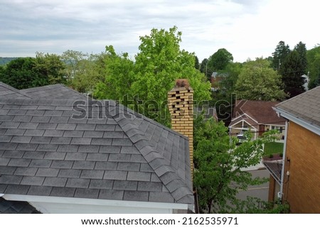 View of an old failing, crumbling chimney on a Pennsylvania house.
