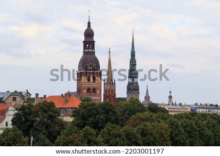 View of Old Riga with 3 church towers. Dom, Anglican and St. Peter's Church can be seen.