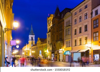 View of Old Town Hall of Torun and monument of Nicolaus Copernicus in night lights, Poland - Shutterstock ID 1550018192