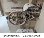 The view of Old and unique cotton gin machine. The cotton engine or cotton gin, that is used to dirty cotton cleaning. Industrial equipment. industrial concept.