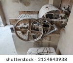 The view of Old and unique cotton gin machine. The cotton engine or cotton gin, that is used to dirty cotton cleaning. Industrial equipment. industrial concept.