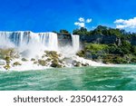 View on the Bridal Veil Falls and American Falls of the Niagara Falls, the part of Goat Island, the Cave of the Winds Lookout, stairs and platforms, wooden walkways, Niagara Falls, New York, USA High