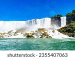 View on the Bridal Veil Falls and American Falls of the Niagara Falls, the part of Goat Island, the Cave of the Winds Lookout, stairs and platforms, wooden walkways, Niagara Falls, New York, USA High