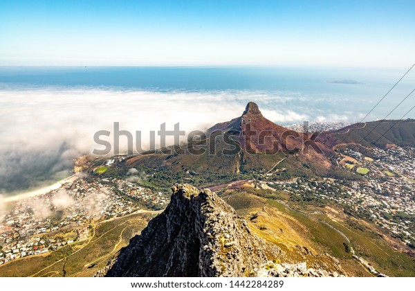 View on Cape Town, Lion\'s Head and Signal Hill\
from the top of Table\
Mountain.