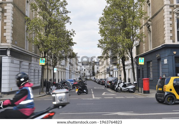 A view on Clanricarde Gardens street from\
Bayswater road, London, Great Britain, UK. Two cul-de-sac signs at\
the entrance. Space for copy.\
