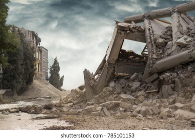 View on a collapsed concrete industrial building with dark dramatic sky above. Damaged house.