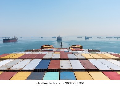 View On The Containers Loaded On Deck Of Cargo Ship. Vessel Is Transiting Suez Canal On Her International Trade Route. 