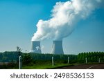 View on cooling towers of nuclear power plant thermal power station in which heat source is nuclear reactor, France, Europe, cheap energy source