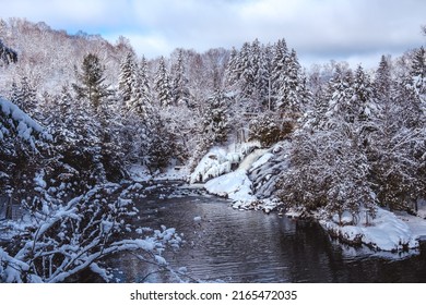 View On Devil's River Waterfall (Chute De La Rivière Au Diable) Under The Snow During Winter, Located Near Mont Tremblant In Quebec (Canada)