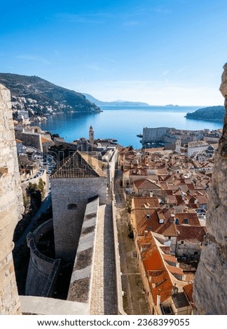 View on the Dubrovnik old town and its red clay rooftops from the Minceta tower, made from stone blocks, high above Adriatic sea
