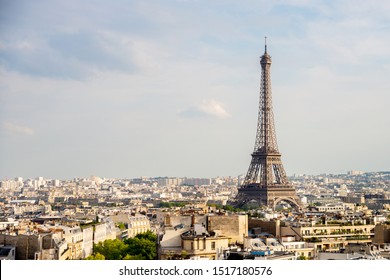 View on the Eiffel Tower in Paris with white clouds in the background