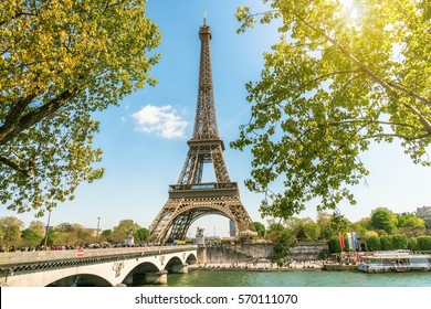 view on Eiffel tower under sunny summer sky