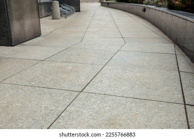 View on empty sidewal path. Footpath covering