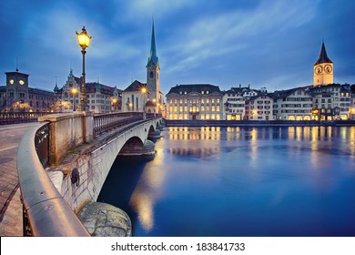 view on Fraumunster Church and Church of St. Peter at night, Zurich, Switzerland