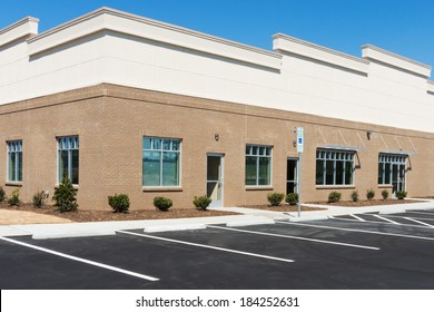 View On A Generic Small Office Building Exterior With Parking Lot