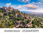 View on Gordes, a small typical town in Provence, France. Discover the stunning hilltop village of Gordes in Provence. Ancient hilltop village of Gordes, Provence, France.