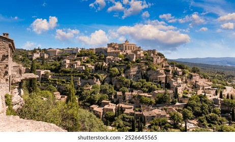 View on Gordes, a small typical town in Provence, France. Discover the stunning hilltop village of Gordes in Provence. Ancient hilltop village of Gordes, Provence, France. - Powered by Shutterstock