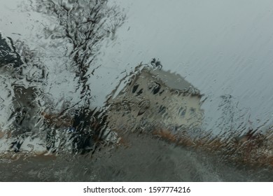 View On The House Throught The Rainy Glass, Lofoten Norway. Abstract