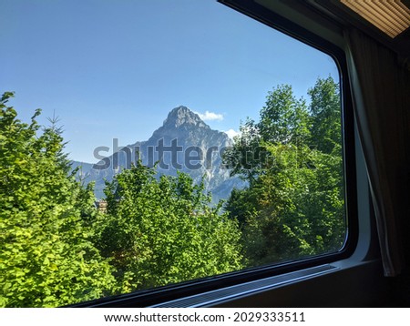 View on mountain and forest from the train window