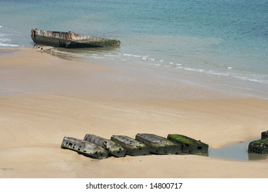 View on Mulberry harbour at Arromanches, Normandy, France, with the remains of the artificial harbour, used on D-Day in World War II