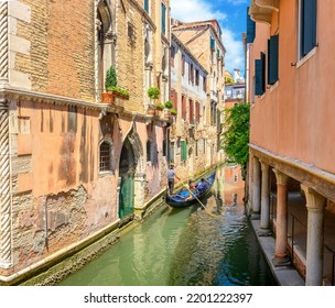 View on the narrow cozy streets of the canals with gondolas one of the symbols of Venice, Italy. Architecture and landmark of Venice. - Powered by Shutterstock